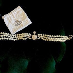 Vivienne Westwood three strand pearl choker with dust bag. Great condition.